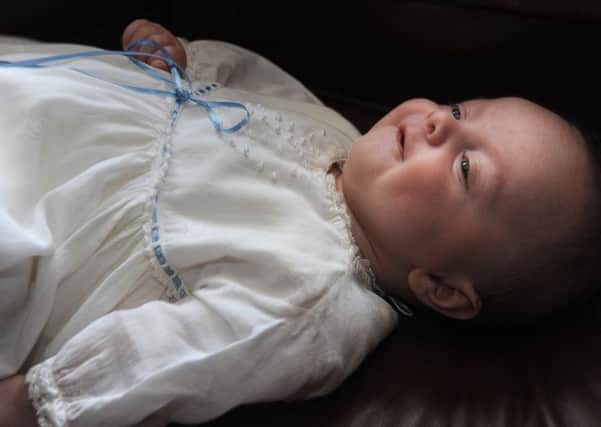 Harrison Holt, of Lea Lane in Lea Town, will be christened on the 11th December wearing the same gown as his great-grandfather and 24 other members of the family wore for their christening.Harrison in his gown.  PIC BY ROB LOCK10-12-2016