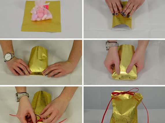 This pouch-style method of gift wrapping will make those hard-to-wrap presents look extra cute underneath the tree.