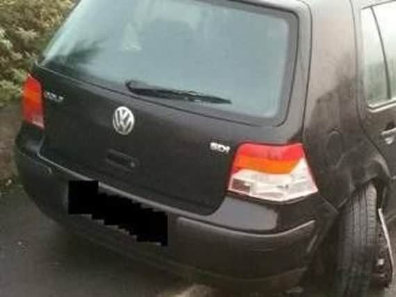 The car collided with a parked Volkswagen Golf
Image: Lancashire Police