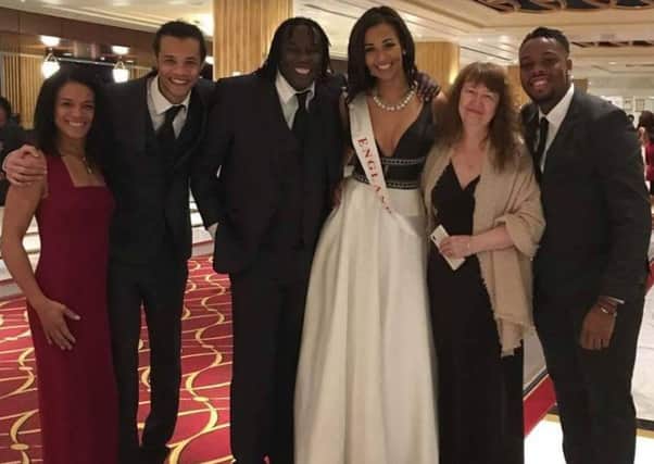 Elizabeth Grant with family and friends at the Miss World competiton in Wasginton DC