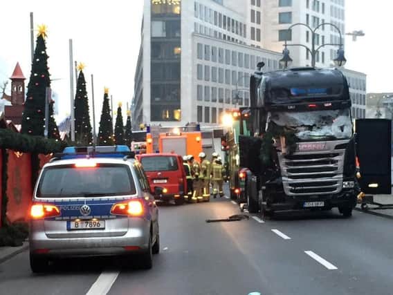 The scene after a truck ploughed into a crowded Christmas market outside the Kaiser Wilhelm Memorial Church in Berlin, as the truck was deliberately crashed in a suspected terrorist attack, police said. (Pic: Claire Hayhurst/PA Wire)