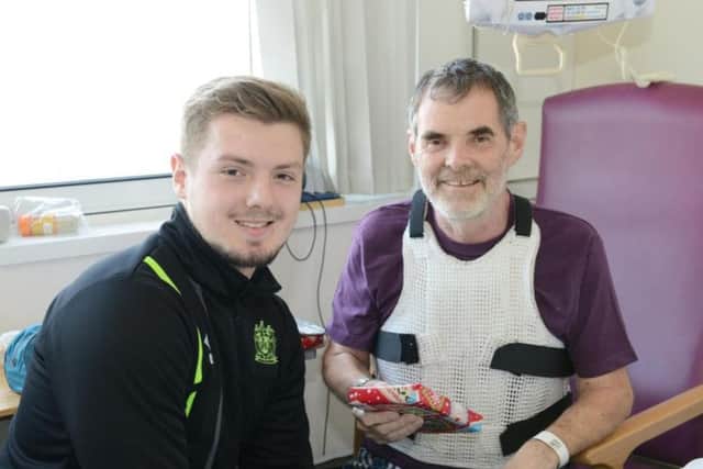 The Warriors Liam Paisley with Richard Sayle at Rosemere Cancer Centre