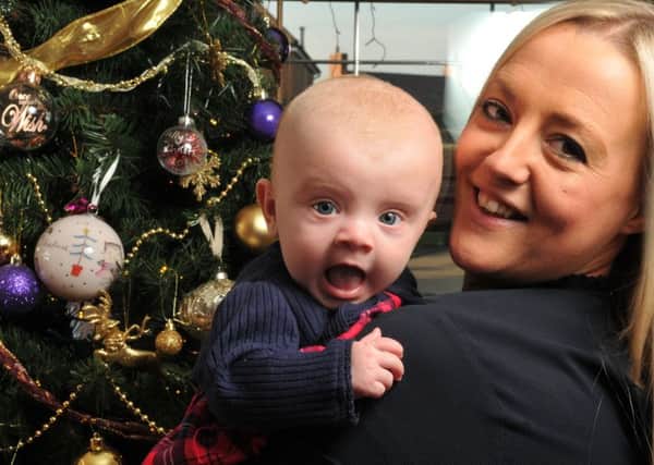 Photo Neil Cross
Carley Donlan with her miracle baby Nelly. She was born to Carley and husband Tony after 10 years of trying