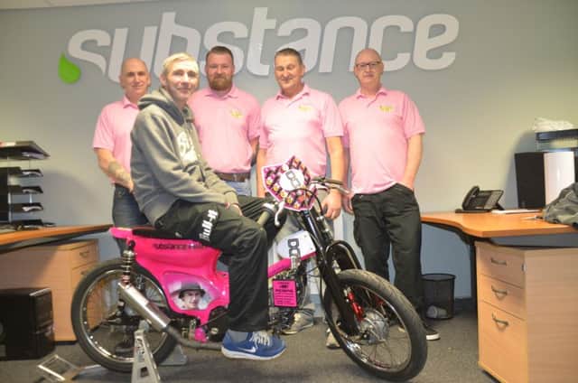 L-R: Chris Simpson, Malachi's dad Kevin Thomas sitting on the bike, Martin Downer, Steve Simpson and Dave Jackson Friends and family of Chorley biker Malachi Mitchell-Thomas who died have raised Â£830