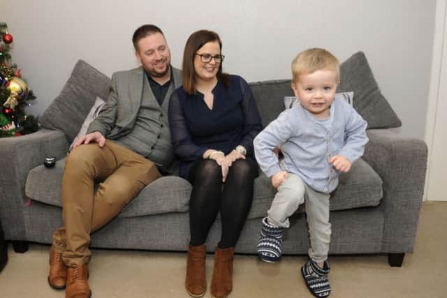 Two-year-old William Goldsmith has become an internet sensation after a video of him dancing went viral.  He is pictured with mum and dad Matthew and Tracey Goldsmith.