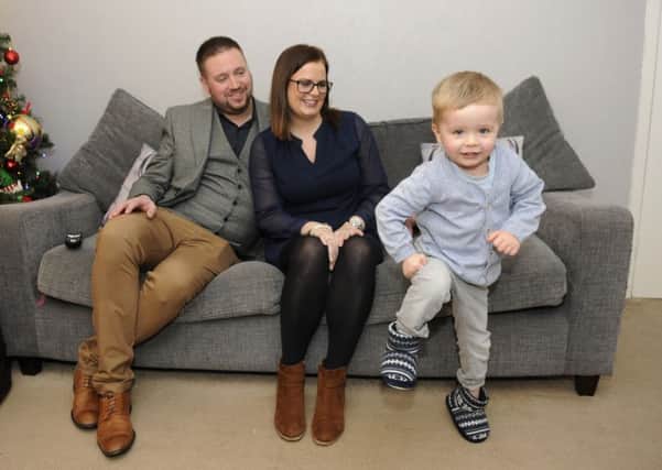 Two-year-old William Goldsmith has become an internet sensation after a video of him dancing went viral.  He is pictured with mum and dad Matthew and Tracey Goldsmith.