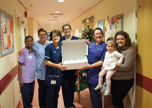 Turtle love: Kayleigh Gray brings her donation in to  Royal Preston Hospital