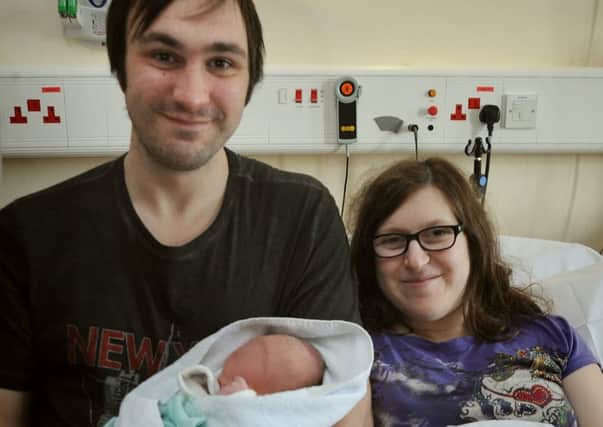 New Year babies at the Royal Preston Hospital. Alex Minuti and Sally White from Clayton-le-Woods with baby Michael Alan George Minuti, who was born at 10.52am weighing 6lb 3.5oz