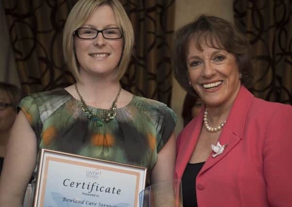 Carer Emma Hardcastle from Bowland Care Services  receives her Dementia Initiative Award from Esther Rantzen at LWDP's Celebrating Good Care Conference