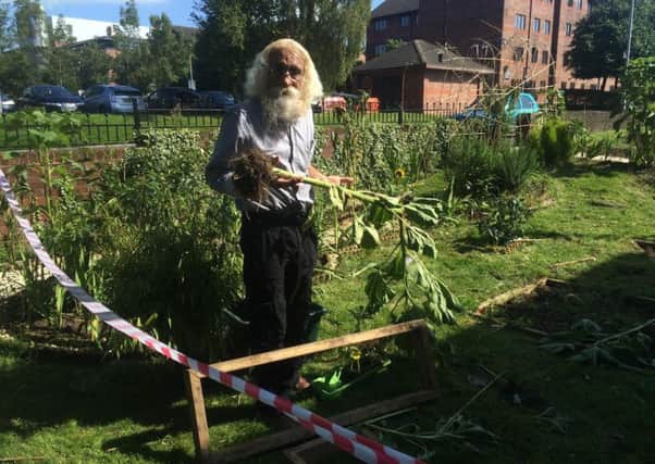 Trouble: Jam Imani Rad pictured in the communal garden shortly after the attack