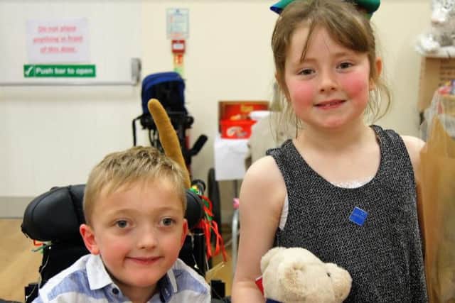 Luke Carter and Rose Brewin, both 8 from St Thomas' School in Garstang. Rose helped organise a New Year's Eve party to fundraise for Luke's SDR surgery.