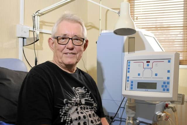 Steve Walton with his dialysis machine, at home in Leyland