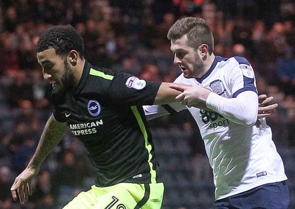 Tom Barkhuizen battles with Connor Goldson