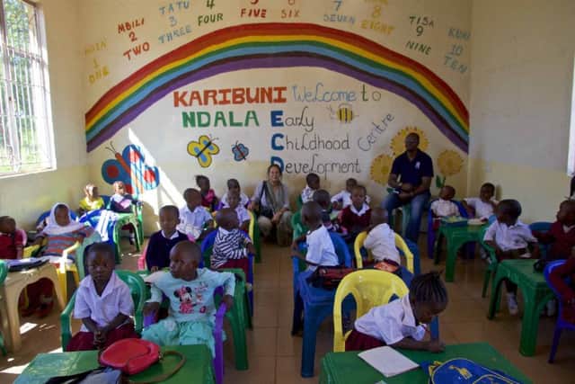 Carolyn Rayner with children from the Ndala early childhood development centre in Tanzania