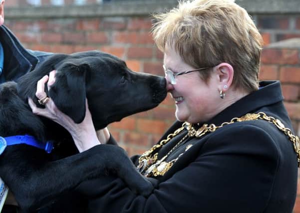 Councillor Marion Lowe on a happy occasion meeting Chorleys community guide dog puppy Astley when she was the mayor of Chorley