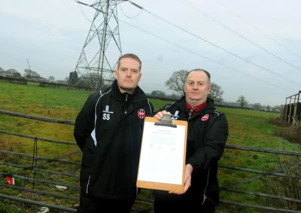 Club development officer Stuart Smith (left) and chairman Darryl Cartwright of Lostock Hall Juniors Football Club