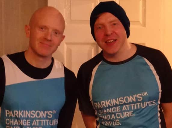 Michael and Alan Rushe who have been running at least 5k a day for a year