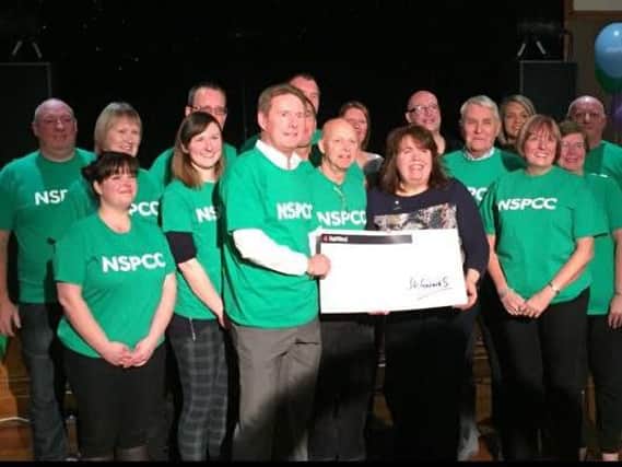 St Gerard's Catholic Club, in Lostock Hall,  has spent the last year raising  20,000 for the NSPCC