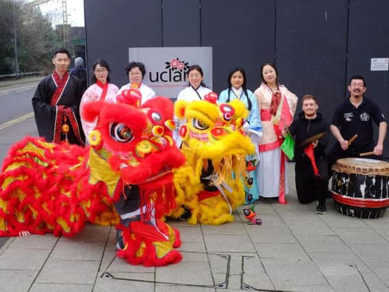 UCLan students and members of the Confucius Institute rehearse the Chinese lion dance for the New Year celebrations