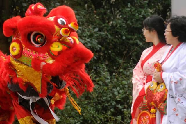UCLan students and members of the Confucius Institute rehearse the Chinese lion dance for the New Year celebrations