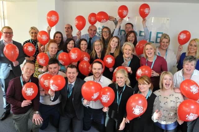 Photo Neil Cross
Staff at Profile Financial Services preparing to become one of the Comic Relief call centres for this March