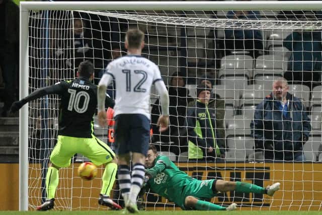 Maxwell saves a penalty from Brighton & Hove Albion's Tomer Hemed

.
