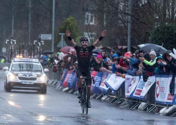 Edmund Bradbury takes the cheers of the crowd as he claims victory in the Chorley Grand Prix 2016