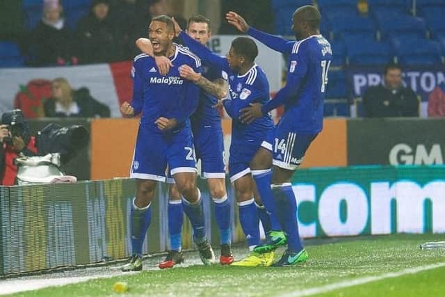 Kenneth Zohore is congratulated on scoring Cardiff's second goal.