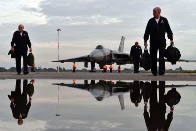 The crew walking away from Vulcan XH558 after its final flight at Doncaster's Robin Hood Airport.