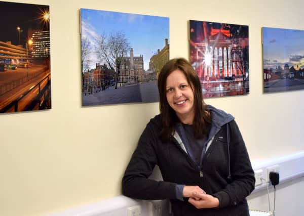 Preston Photographer Donna Clifford with her first landscape and cityscape collection she has given to the SPACE centre for their Garden View Room.