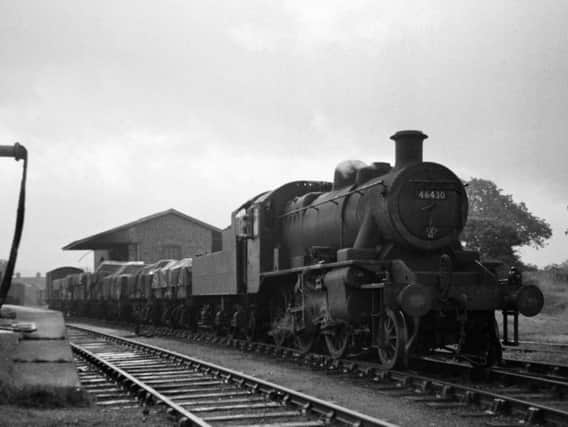 A goods train going through Garstang station in the 1950s