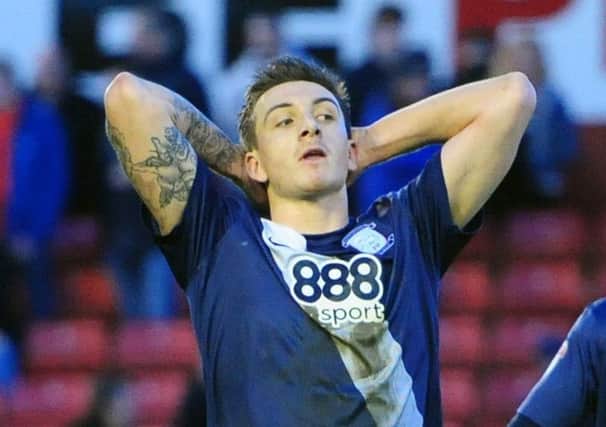 Preston North End's Jordan Hugill reacts after his header was saved by Barnsley's Adam Davies