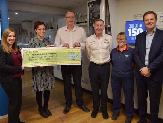 St Catherines fundraiser Emma Jacovelli, second from the left, with staff from Baxi in Bamber Bridge