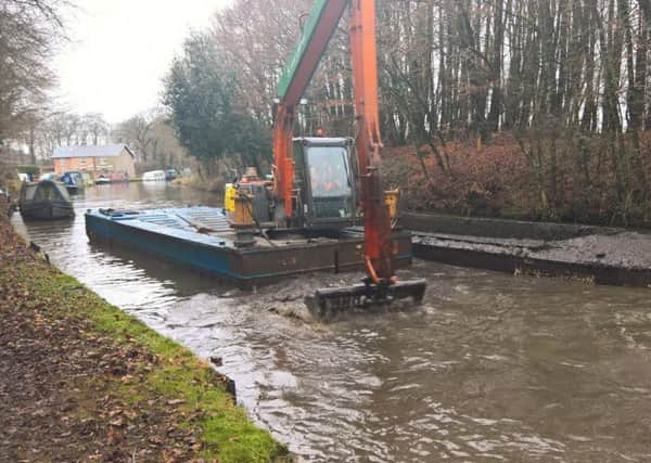 Dredging work taking place on the Lancaster Canal. Photo: Canal & River Trust
