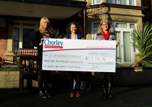 Marketing manager ZÃ¶e Patterson of Chorley Building Society pictured in the centre with Susan Clemson, director of Finance and Technical Services on the right