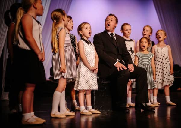 Children perform Edelweiss from the Sound of Music