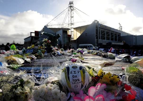Tributes are laid outside Deepdale Stadium in memory of Sir Tom Finney prior to his Civic Funeral.