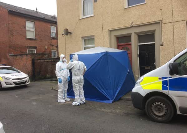 Police at murder scene at Chatsworth Street, Preston