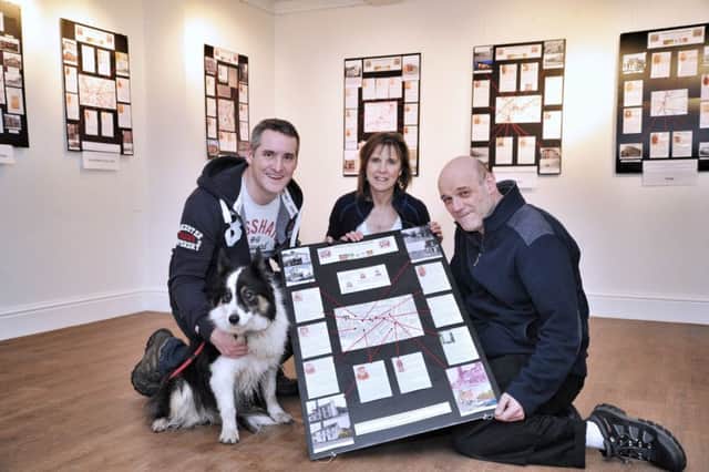 Picture by Julian Brown 11/02/17

Local Historians, Richard and Linda Langford, Adam Cree and Tinker the dog who have been working together to connect Chorley's Pubs to its casualties of World War One pictured at their pop up exhibition at Astley Hall Farm House, Astley Park, Chorley,