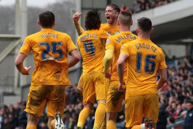 Joe Garner celebrates scoring Preston's equaliser at Blackburn