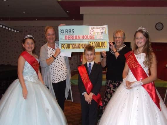 Adlington 2016 carnival queen Heather Kirkham-Spear, carnival princess Ruby Charnock and carnival pageboy James Mckone, were delighted to present a cheque to our nominated charity for 2016, Derian House, for 4000