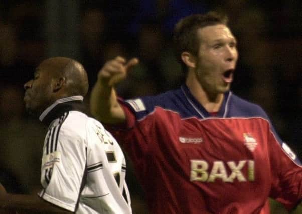 Michael Appleton celebrates scoring directly from a corner to give Preston victory at Fulham in October 2000