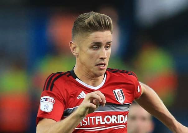 Tom Cairney in action for Fulham
