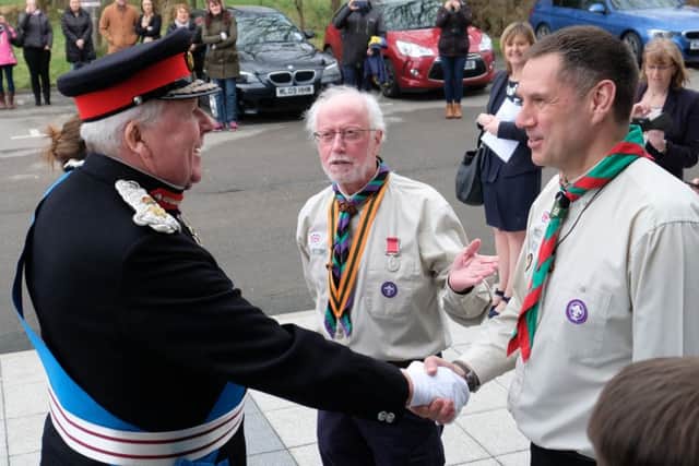 The Lord-Lieutenant of Lancashire, Lord Shuttleworth, meets scout leaders from the 16th Morecambe Scout Group at Torrisholme. Scouts formed a guard of honour for VIPs as they arrived at the ceremony. Photo by Denis Oates.