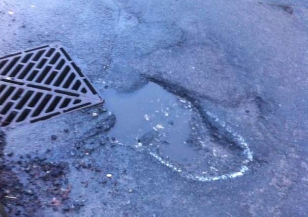The pothole that Bekki Watts burst her tyre on in Town Lane