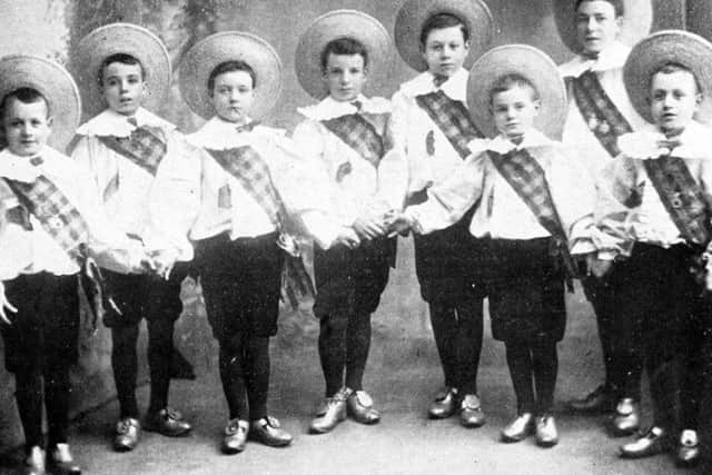 The Eight Lancashire Lads pictured in 1899 and featuring a young Charlie Chaplin