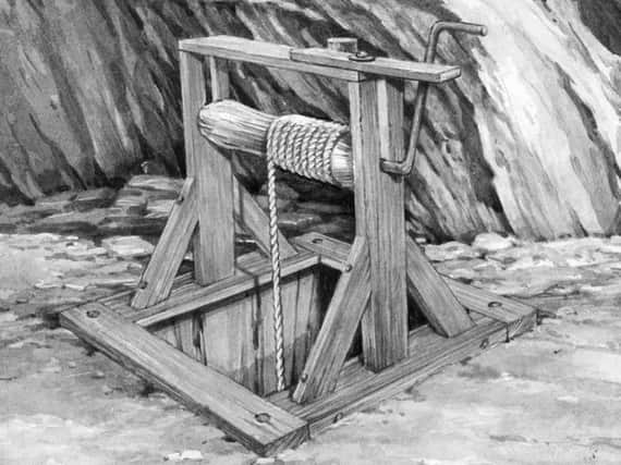 This illustration of a turn tree shows the method used in Wrays coal mines for raising the coal from the shaft bottom to the surface. It was also used by the miners to travel up and down the pit shaft. Illustration by John Robinson.