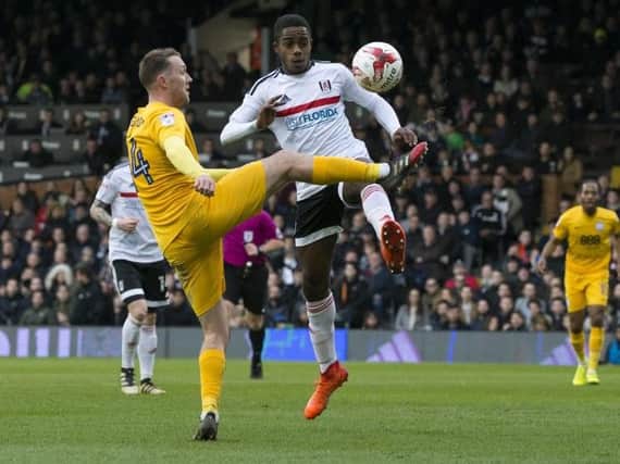 Aiden McGeady battles for the ball at Craven Cottage.