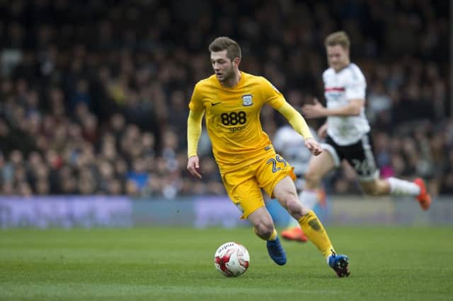 Preston North End's Tom Barkhuizen in action against Fulham.