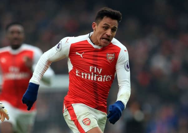 Arsenal's Alexis Sanchez has been linked with a move to Paris St Germain